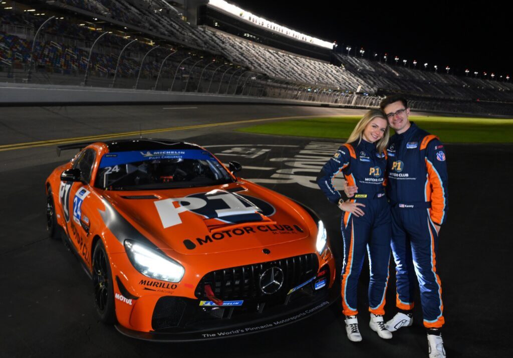 Kenny Aurora next to Mercedes P1 racecar before IMSA